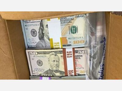 FOUR POUNDS OF MONEY: Cardboard box filled with a $180,000 cash donation mailed to The City College of New York