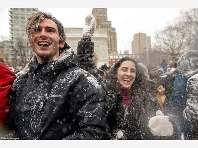 CITY LIFE: A Huge Snowball Fight Breaks Out In Washington Square Park